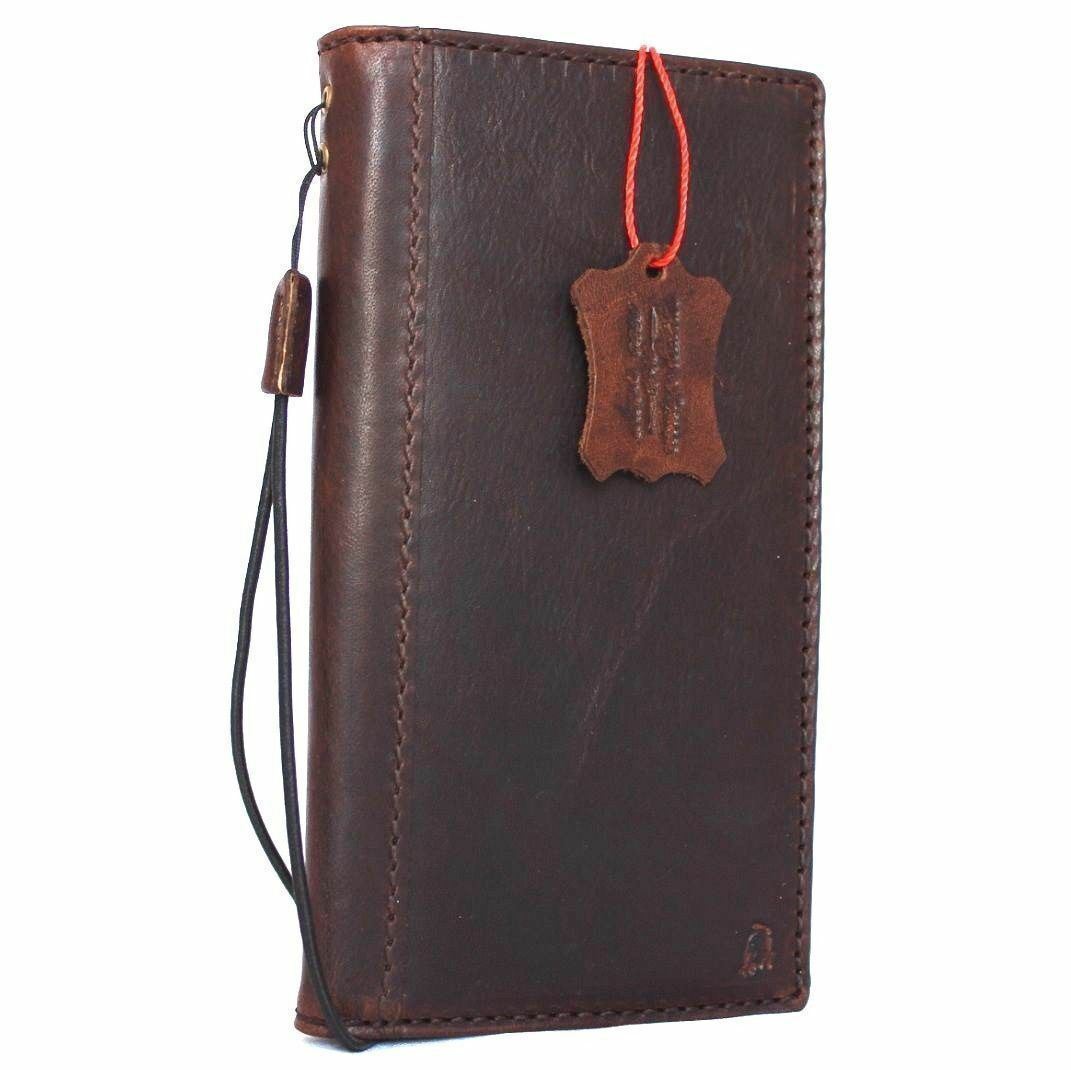 Genuine full leather iPhone 8 case with wallet card slots, slim design, and classic Art Davis branding for wireless charging compatibility.