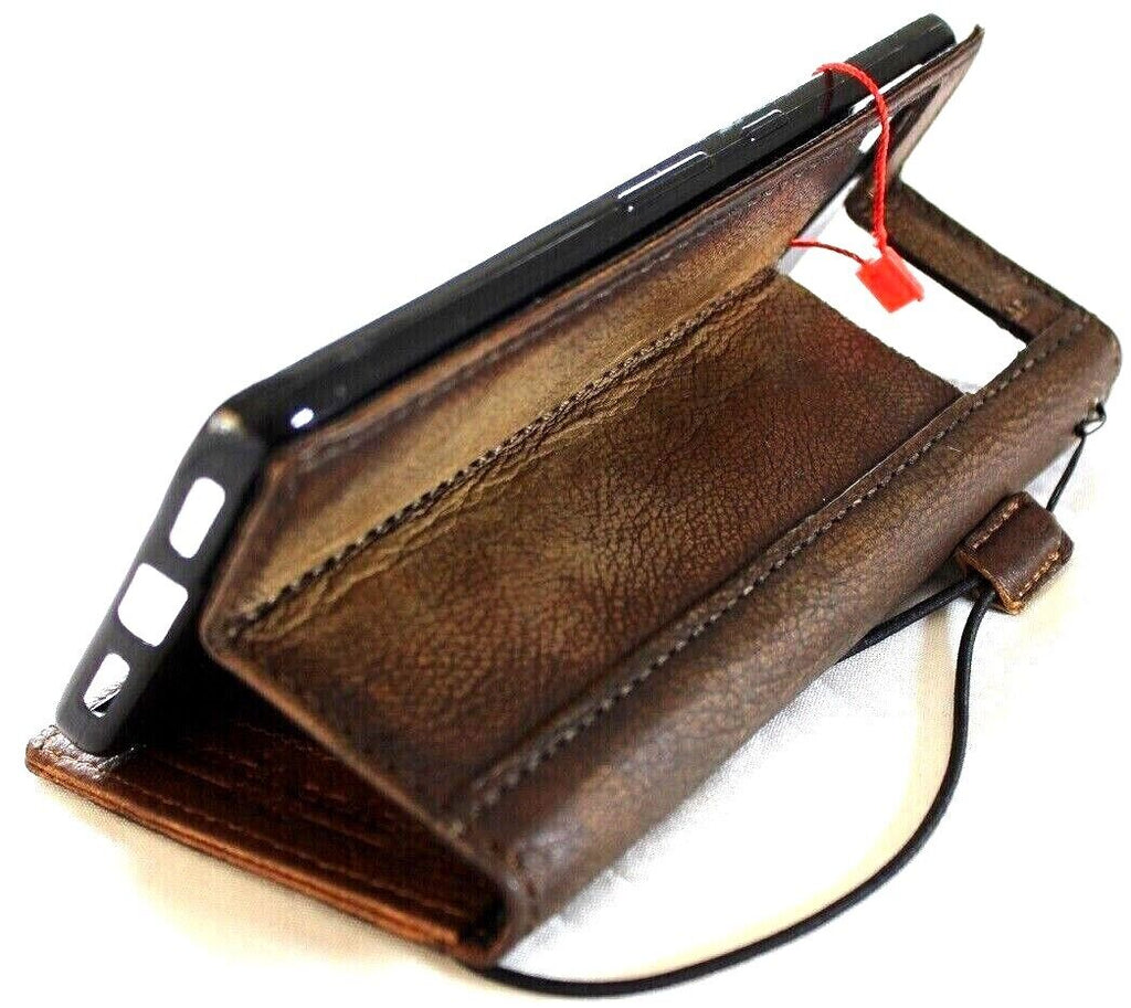 Genuine leather case for Google Pixel 7 Pro by DAVISCASE featuring rustic book wallet design with stand and wireless charging compatibility