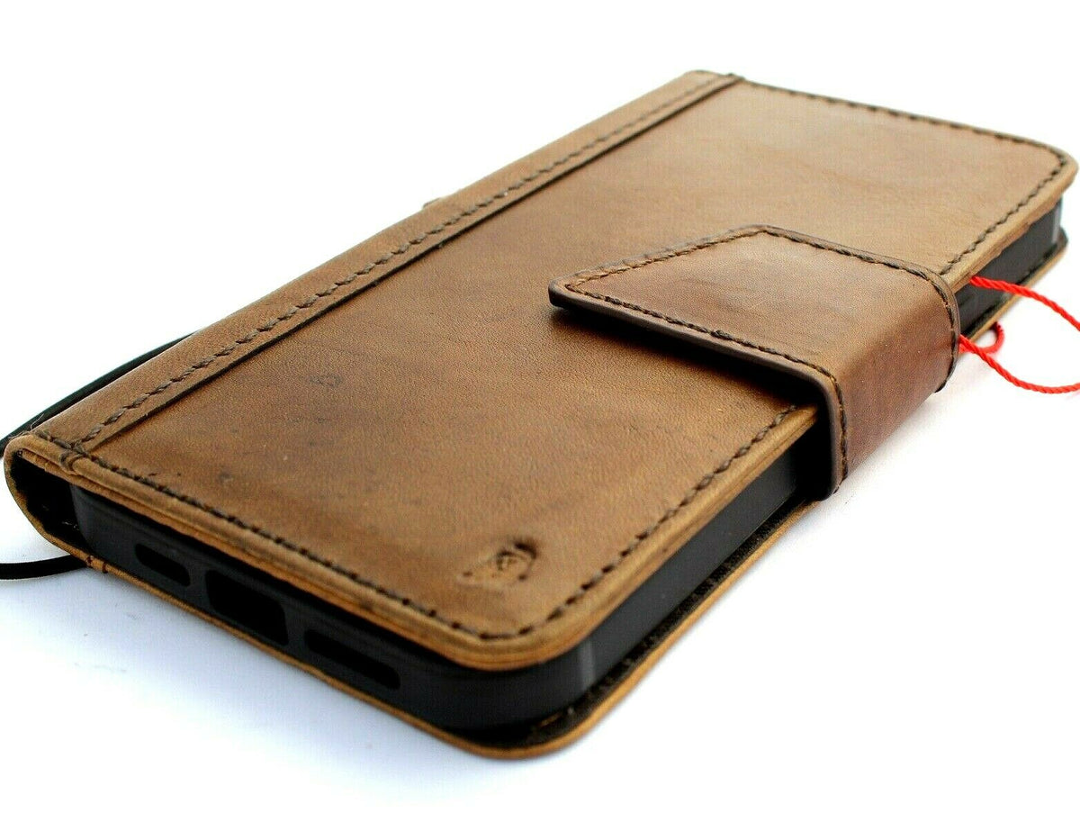 Handmade genuine leather phone case for iPhone 15, 14 Pro Max, and more with vintage style, credit card slots, and magnetic closure.