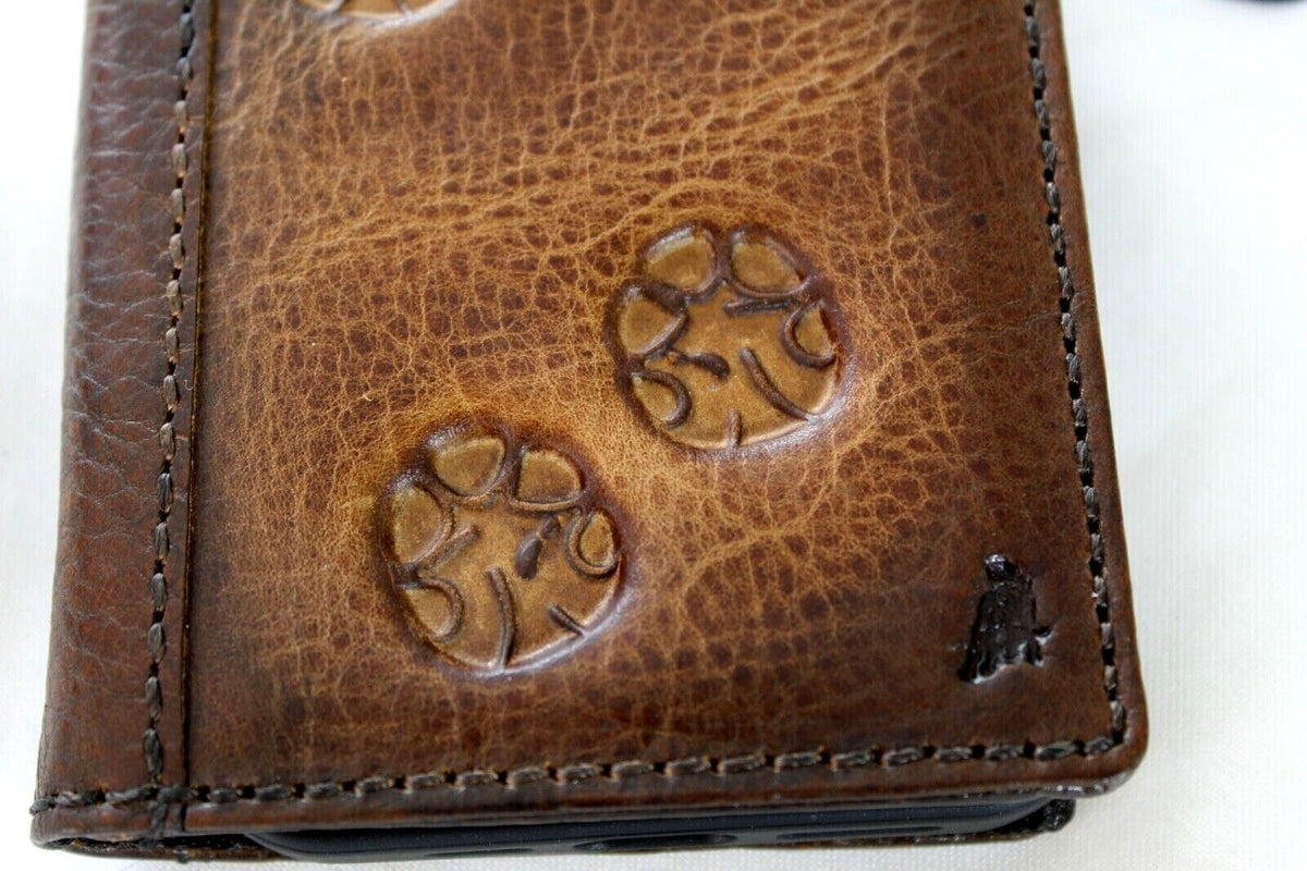 Handmade genuine leather phone case by DAVISCASE for Samsung Galaxy S22, S21, Note 20, A51, A71 with vintage paw elephant design.