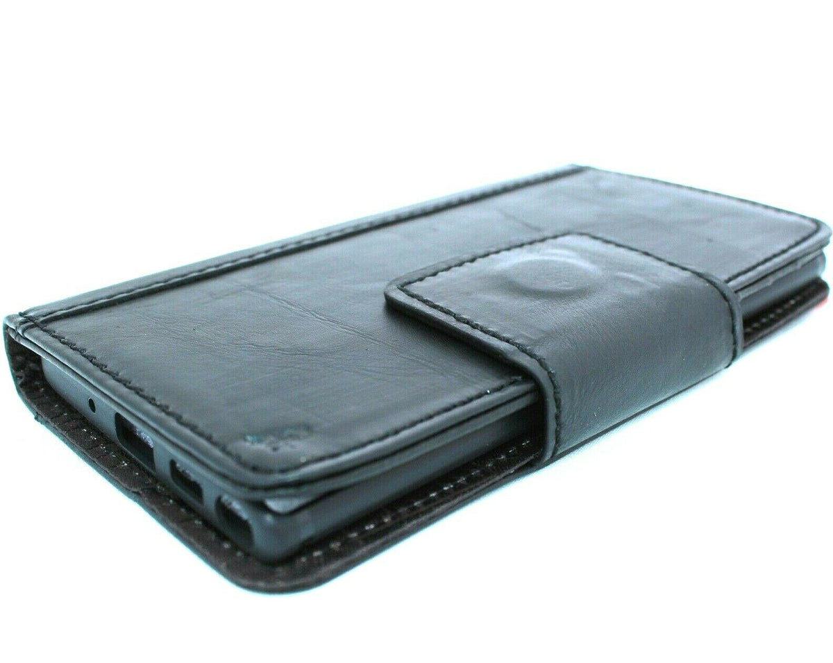 Black genuine leather Samsung Galaxy Note 10 book wallet cover with magnetic closure, soft stand, window, and wireless charging.