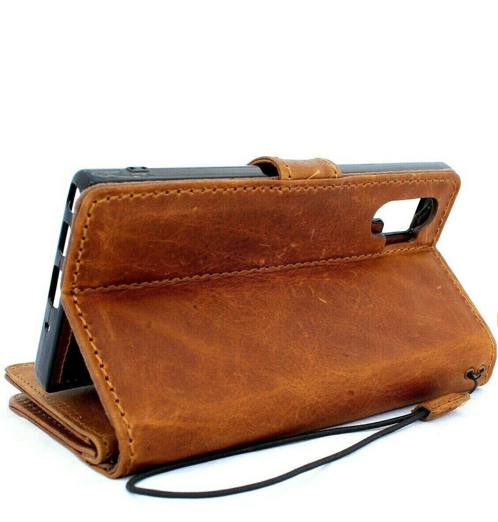 Genuine full leather Samsung Galaxy Note 10 Plus book wallet case with luxury slots, rubber window, magnetic closure, and removable design.