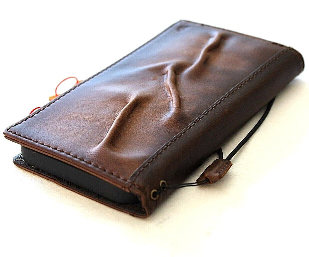 Handcrafted genuine leather phone case for iPhone models, vintage style with card slots, full grain leather, and detailed craftsmanship.