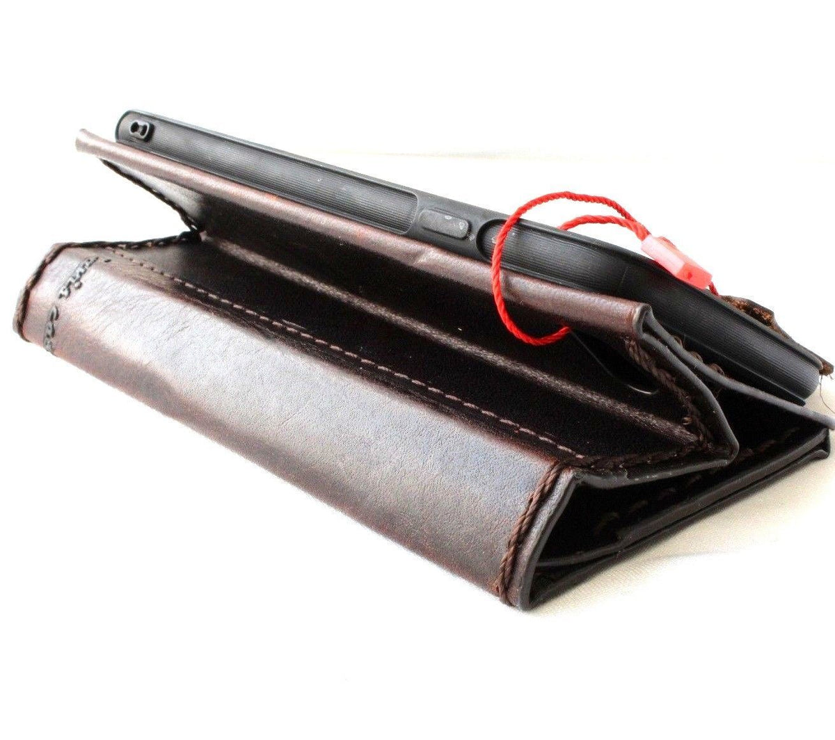 Dark leather handmade iPhone 8 case by DavisCase with wallet card slots, vintage design, slim fit, soft material, wireless charging compatible