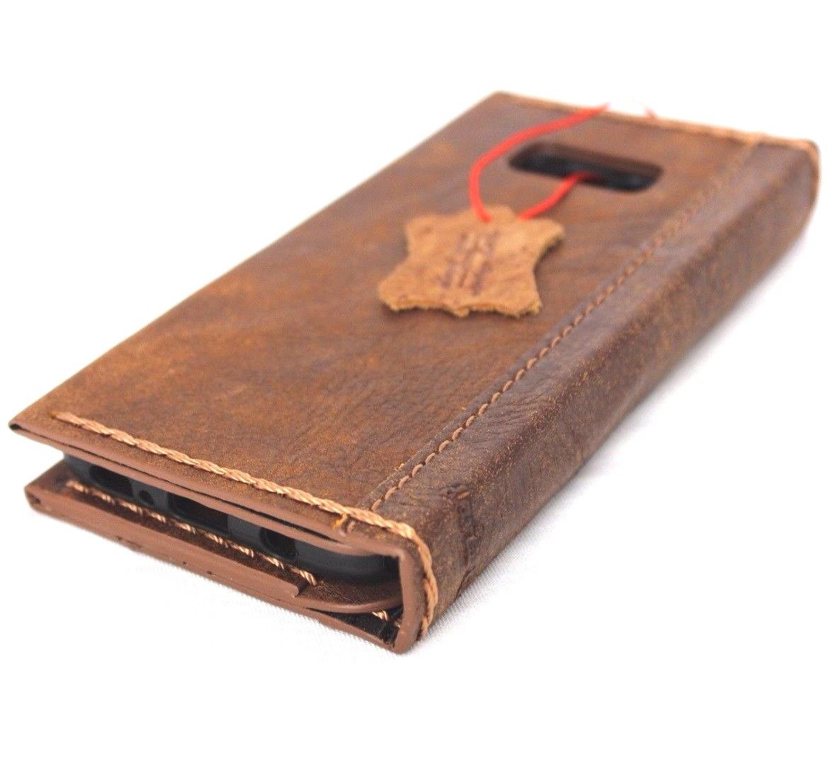 Handmade soft brown leather wallet phone case with card slots for Samsung Galaxy S8 Plus, featuring a sleek book cover design.