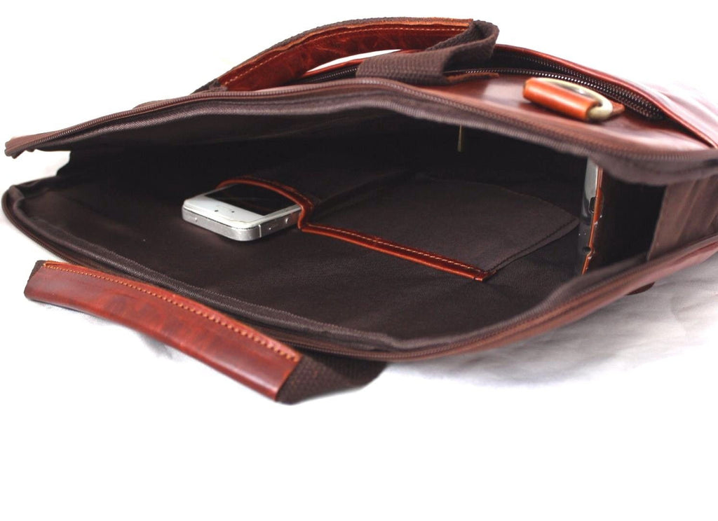 Brown genuine leather men's shoulder bag with crossbody strap, designed for carrying business laptops, by DAVISCASE.