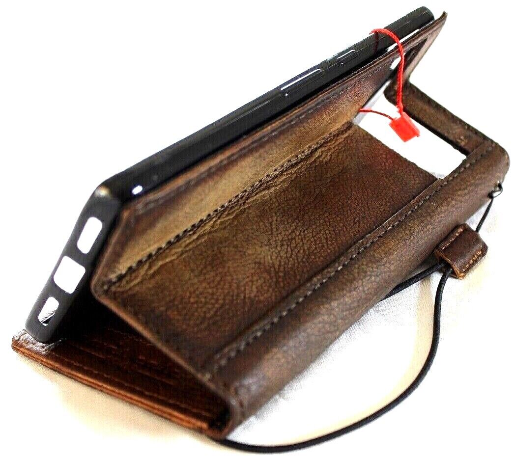 Genuine leather Google Pixel 7 Pro wallet case by DAVISCASE with retro rustic design, stand feature, and wireless charging compatibility.