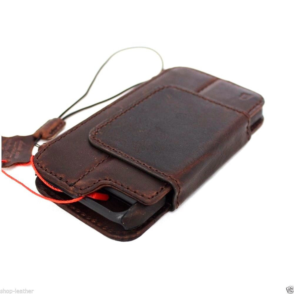 Handmade genuine leather iPhone 6s Plus case with wallet features, credit card slots, ID window, slim design, magnetic closure.