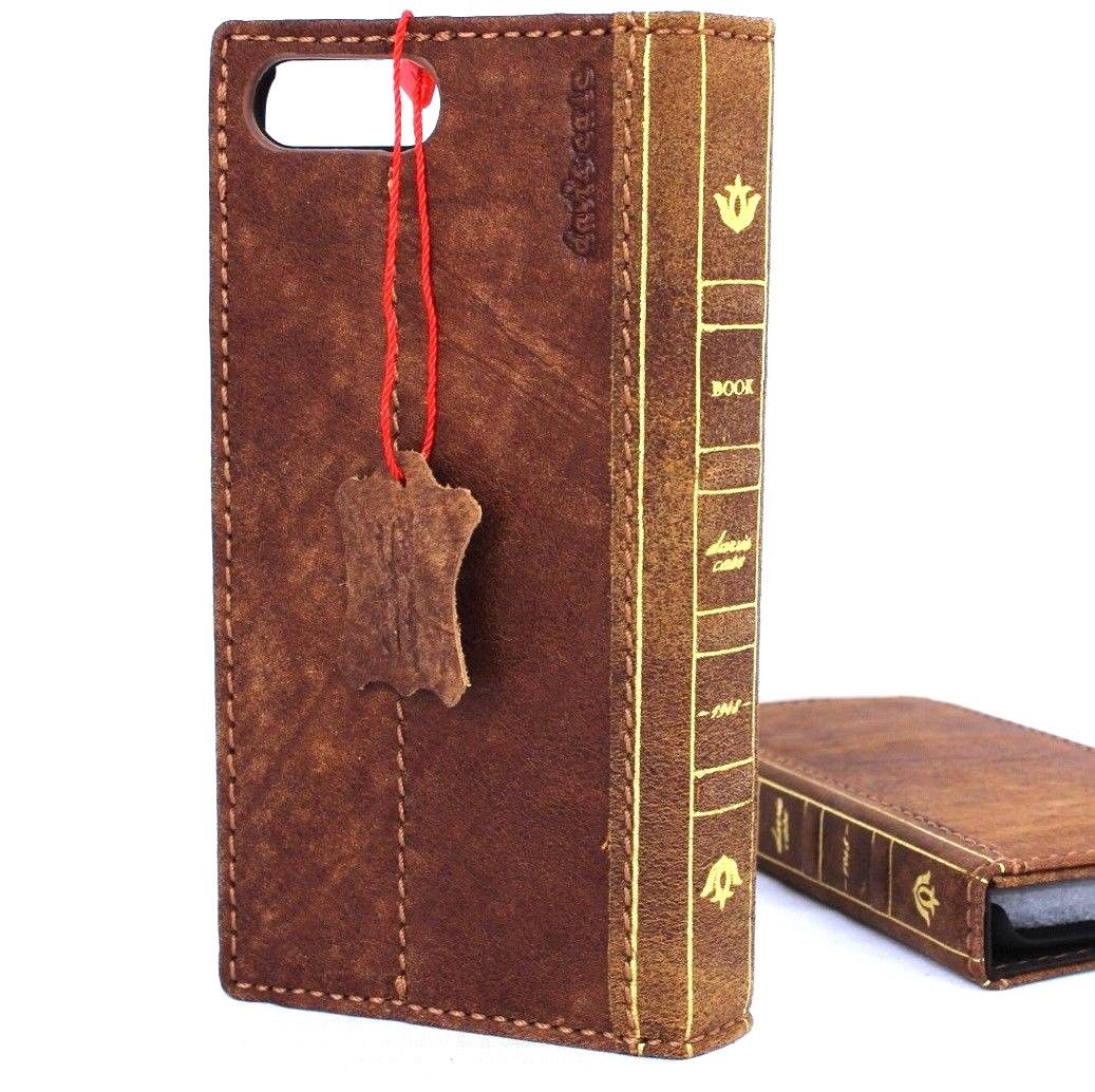 Genuine full leather iPhone 8 case with book-style wallet design, vintage look, slim fit, and slots for cards, compatible with wireless charging