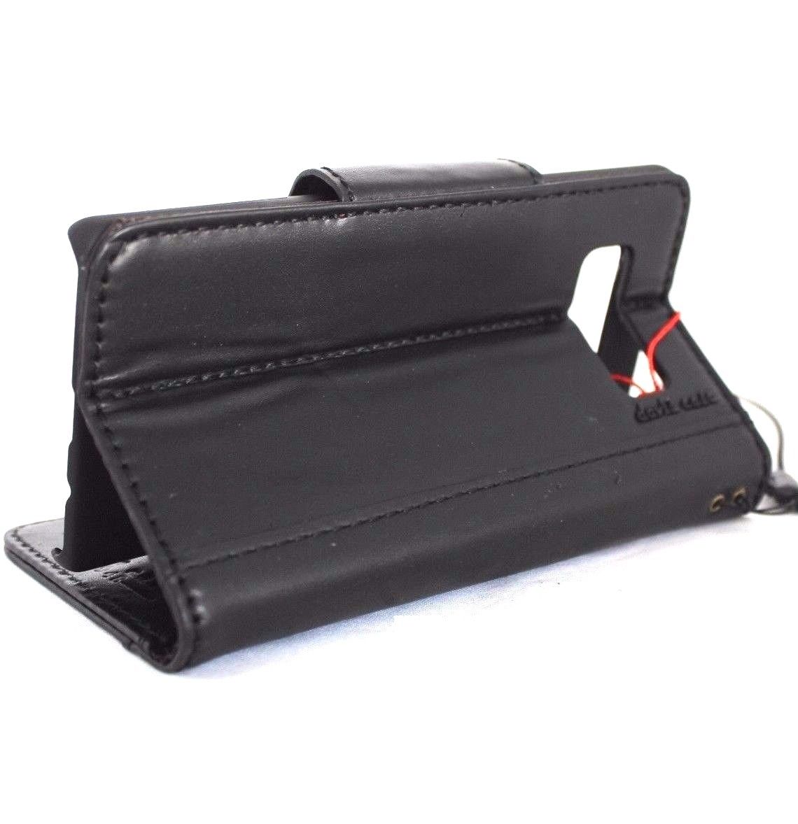 Black genuine vintage leather phone case for Samsung Galaxy Note 8 with card slots and magnetic closure by DAVISCASE.