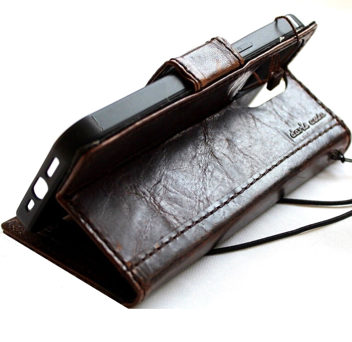 Handmade DAVISCASE genuine leather phone wallet case with vintage dog paw design for iPhone models, featuring credit card slots and full grain leather