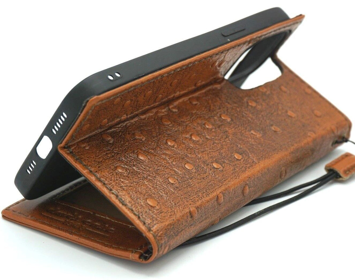 Genuine leather Google Pixel 7 Pro case by DAVISCASE with book wallet design, retro style, stand feature, and wireless charging compatibility.