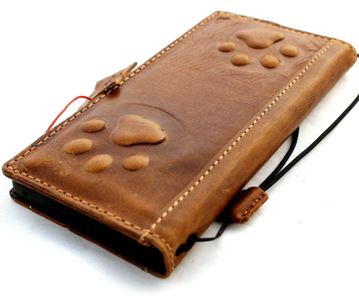 Handmade leather phone case for Samsung Galaxy S22, S21, A71, Note 10, and more by DAVISCASE, featuring a wallet and paw print design.
