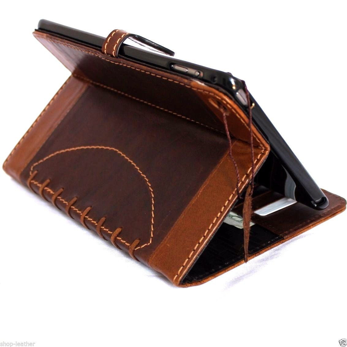 Brown genuine leather iPad mini 4 case with slim, luxury design featuring a sporty football pattern and precise cutouts.