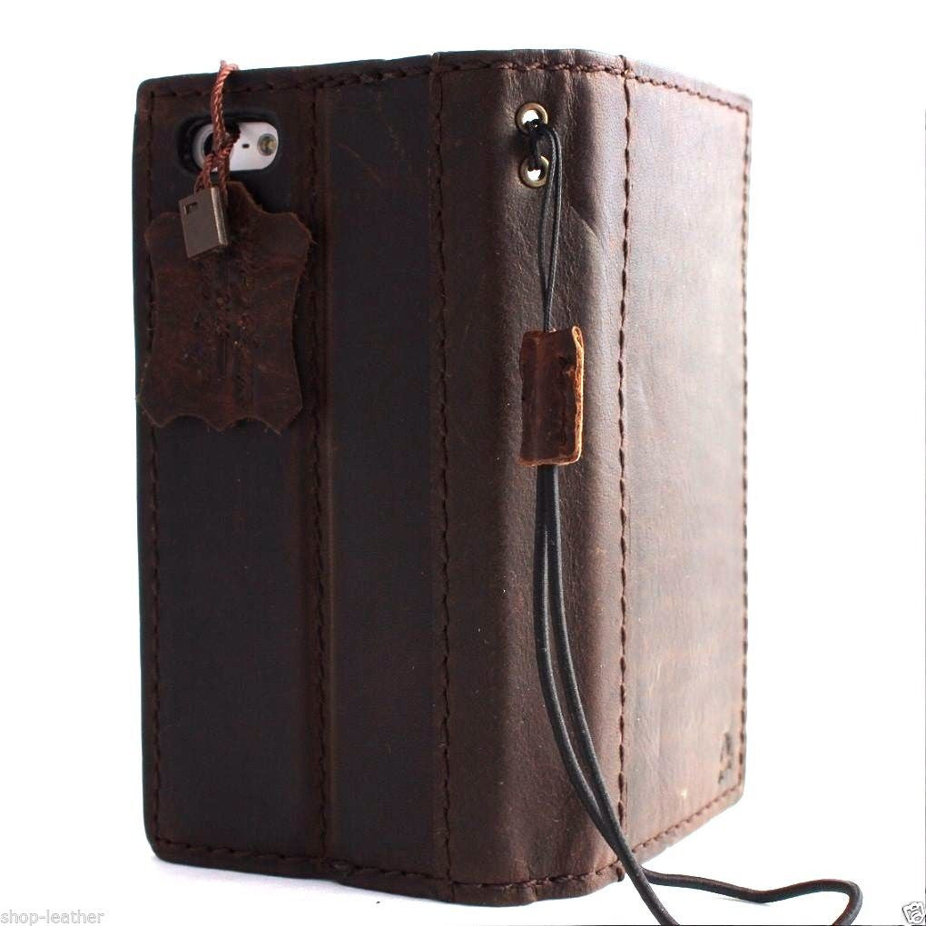 Handmade genuine leather flip case for iPhone 5s/5c with wallet card slots, by DAVISCASE, offering luxury protection and style.