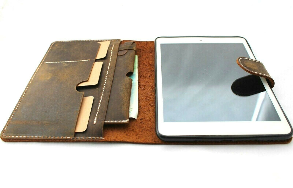 Genuine leather iPad Mini 4-6 case by DAVISCASE with card slots, vintage dog paw design, and embossed lion and bear illustrations.