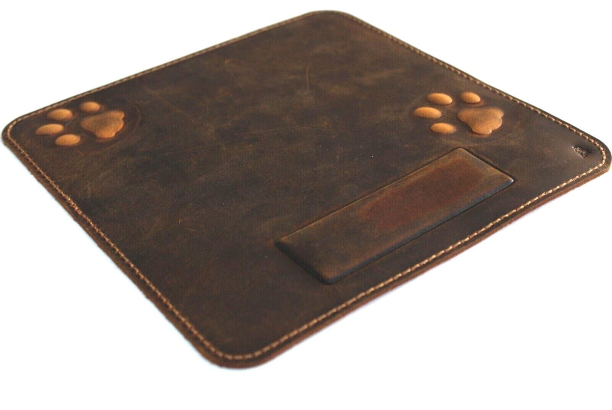 Genuine leather iPad case by DAVISCASE featuring a handcrafted vintage style with embossed dog paw and cat designs.
