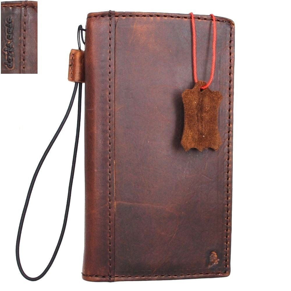 Handmade genuine leather wallet case for Huawei P10 Plus, brown retro design with card slots and slim fit, luxury phone cover.