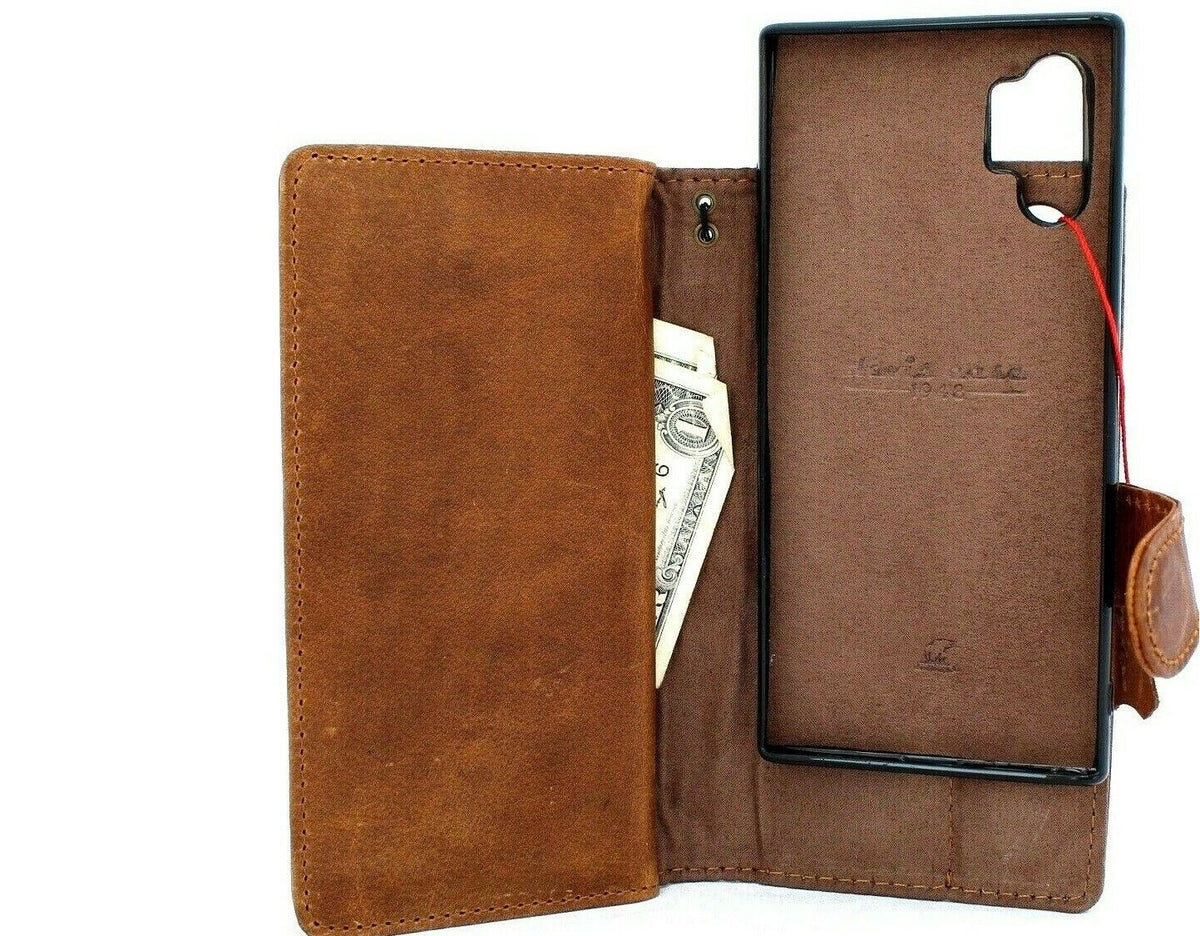 Genuine full leather Samsung Galaxy Note 10 Plus book wallet case with luxury card slots, magnetic closure, and removable rubber window.