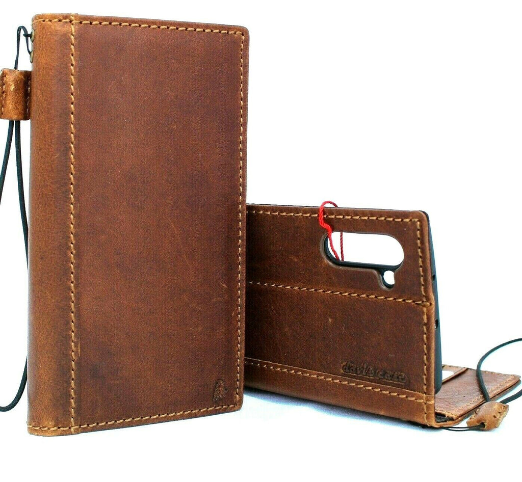 Handmade tan leather phone case for Samsung Galaxy Note 10 with card slots and wallet features, soft retro style.