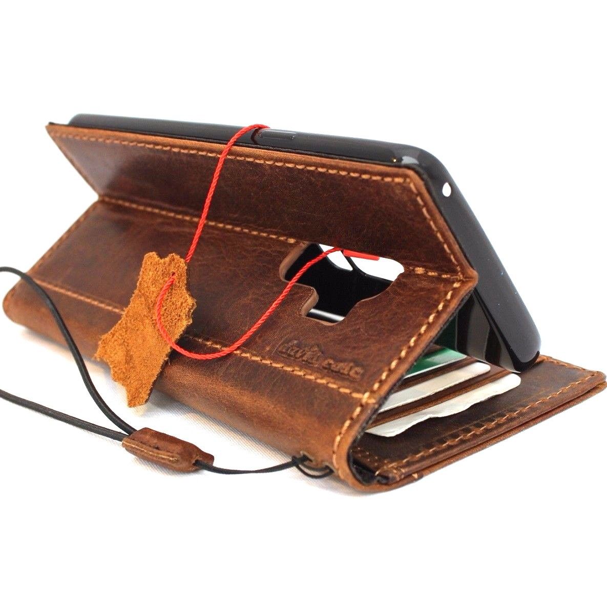 Vintage tan leather Samsung Galaxy S9 Plus wallet case with elastic strap, card slots, and handmade design by DAVISCASE.