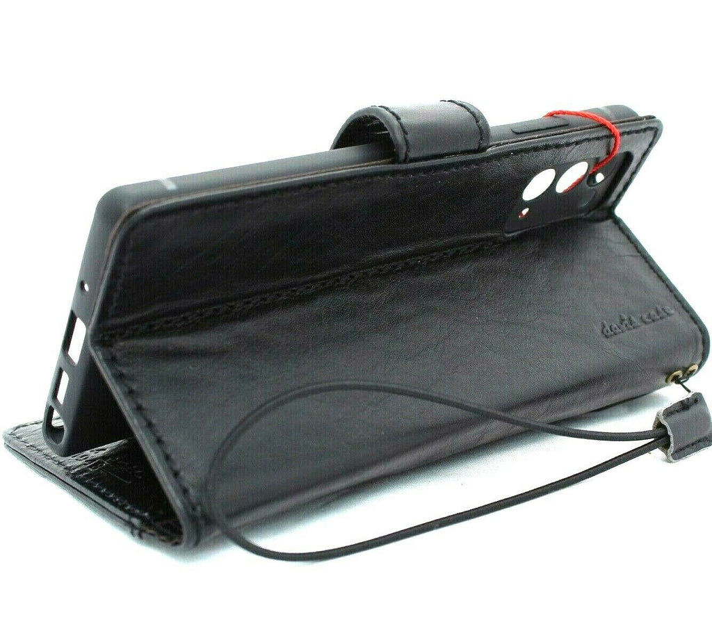 DavisCase genuine black leather wallet case for Samsung Galaxy Note 20 5G with card slots, ID window, and soft rubber interior.