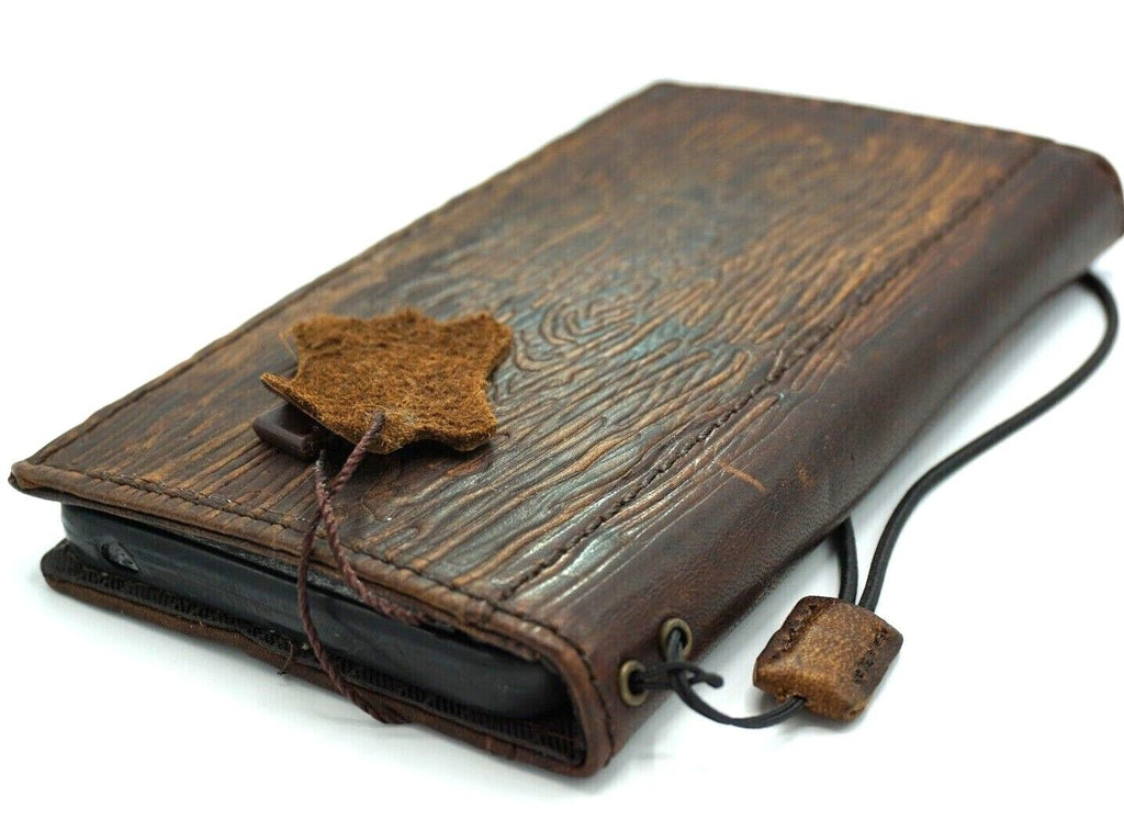 Handmade DAVISCASE leather phone case for iPhone 11 to 15 Pro Max with vintage style, credit card slots, and wood shark design.