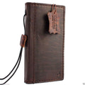 Handmade genuine leather flip cover for iPhone 5s/5c with card slots, featuring a luxury book wallet design by DAVISCASE.