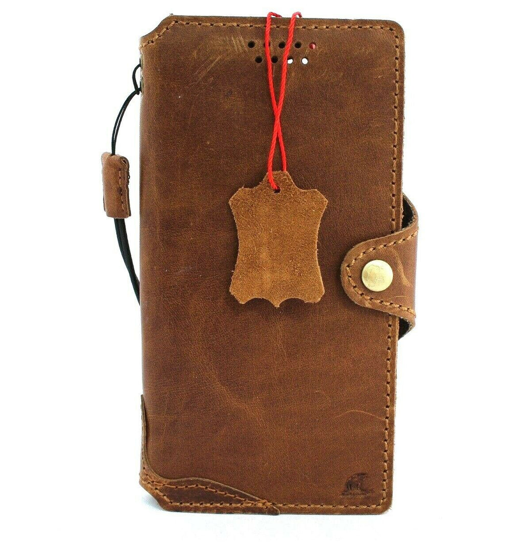 Handmade tan leather Samsung Galaxy S21 wallet case with rubber holder, slim design, and wireless charging compatibility by DavisCase.