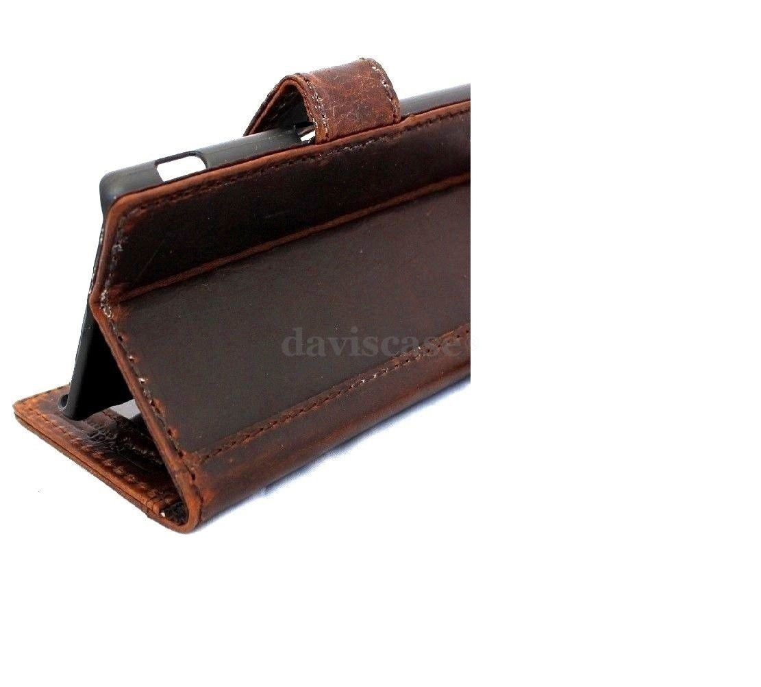 Genuine Italian leather iPhone 6 Plus wallet case with flip cover, credit card slots, ID window, and magnetic closure.